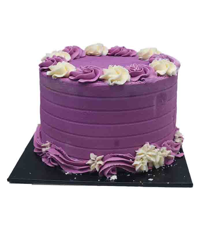 Vanilla-Strawberry-Birthday-Cake-9-2-Layers-in-Purple-Icing.jpg